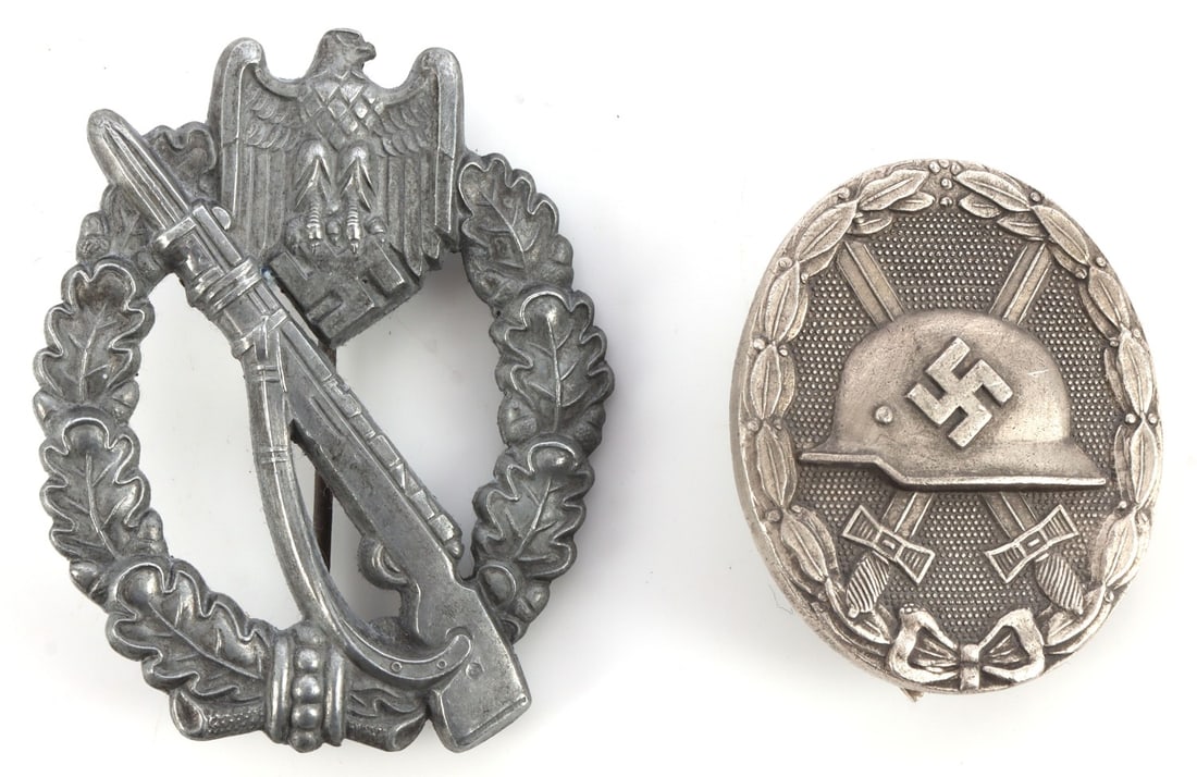 WWII GERMAN INFANTRY ASSAULT & WOUND BADGE: Late war zinc assault badge marked F/Z. Silver wound badge solid type marked 30 They measure 2 3/8 inches and 1 5/8 inches. Very good condition. This lot has a reserve.