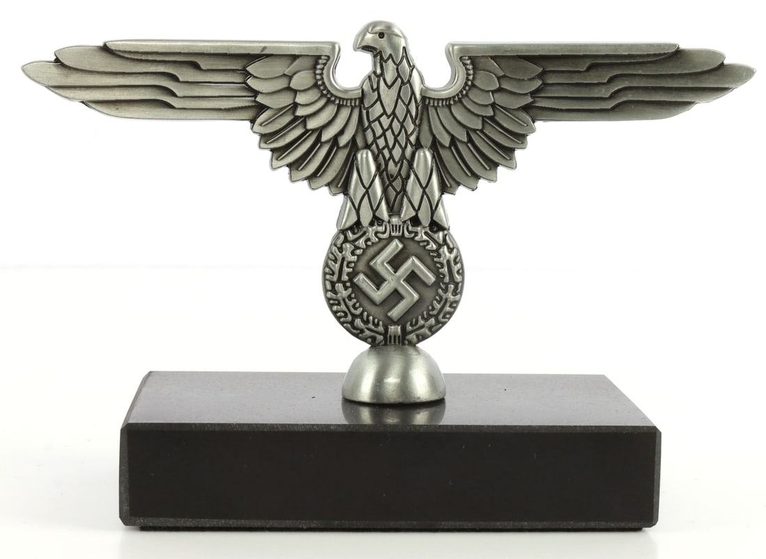 WWII GERMAN THIRD REICH SS REICHSADLER DESKTOP: Reichsadler resembling the one used by the SS. Designed for desk display or use as a paper weight. Eagle is 6 X 3, footprint of item is 4 X 2.5 inches. Unauthenticated, sold "as is."
