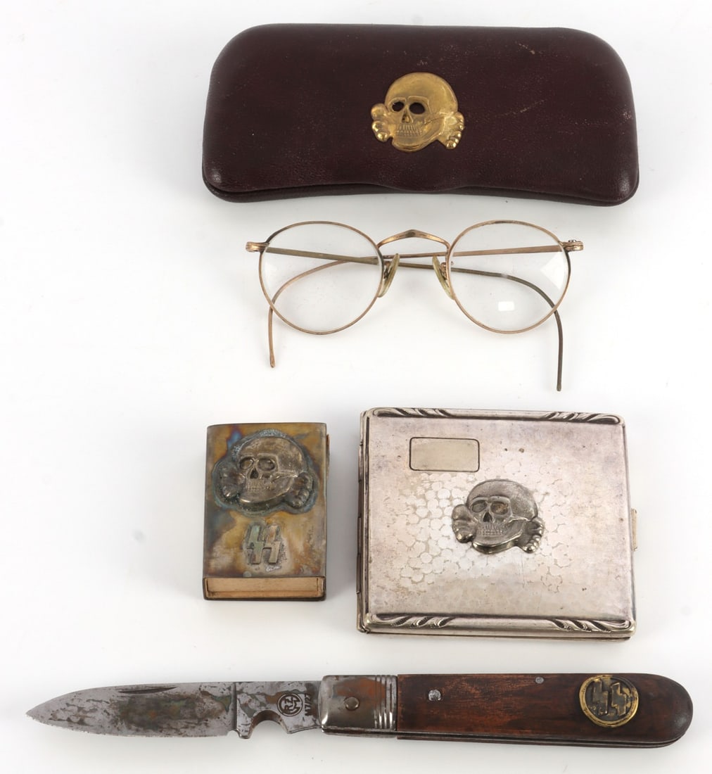 LOT OF 4 WWII GERMAN THIRD REICH PERSONAL EFFECTS: Lot of FOUR (4) personal items displaying the symbols of the Third Reich. Includes: 1) Totenkopf cigarette case, 2) Totenkopf match box cover, 3) SS eyeglass case, and 4) SS pocket knife. All unauthen
