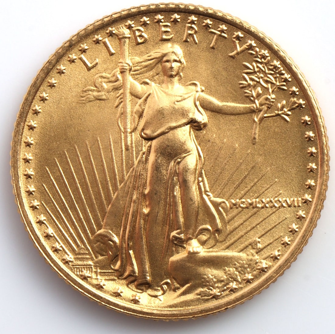 1987 GOLD 1/10 OZT OUNCE AMERICAN EAGLE BU COIN: Brilliant uncirculated. This lot reserves at melt.