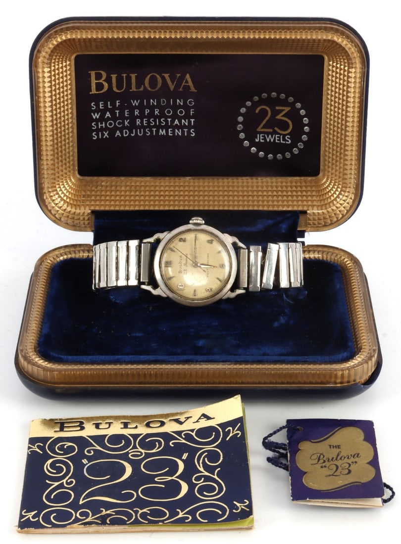 BULOVA SELF WINDING 23 JEWEL MENS WRISTWATCH: Needs service starts but only works for a few minutes. Box with papers.