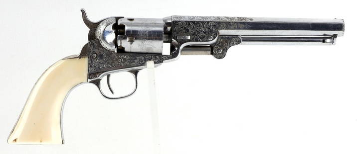 FACTORY ENGRAVED COLT 1849 POCKET REVOLVER CAL .31: Factory engraved, nickel-plated Colt 1849 Pocket percussion revolver, .31 cal, with 6-inch octagonal barrel and antique ivory grips. Production ca. 1858. Short barrel address "Saml Colt." All matching