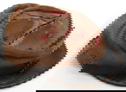 CIVIL WAR CONFEDERATE ARTILLERY KEPI FORAGE CAP: Confederate artillery kepi or forage cap. Exterior of plain woven wool with leather visor and pasteboard disc crown reinforcement. Crown retains traces of red felt. Interior has black leather sweatban