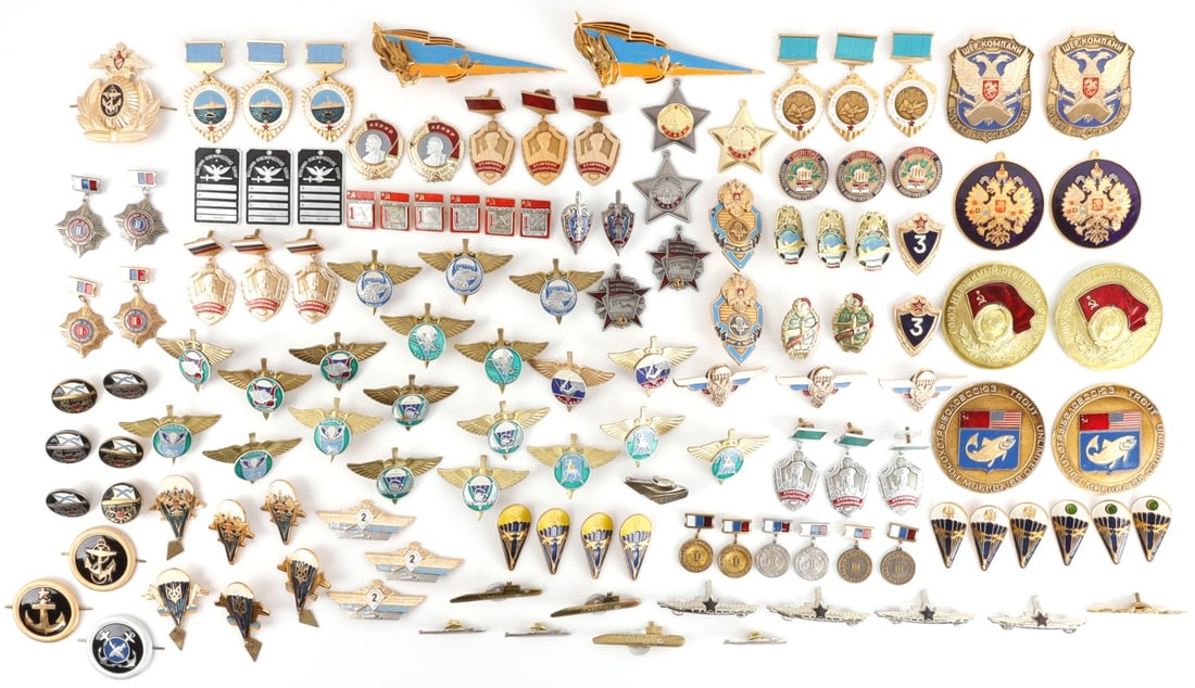 LOT OF 120 MIXED SOVIET & RUSSIAN MILITARY BADGES: Lot of approximately ONE HUNDRED AND TWENTY (120+) Soviet and Russian military badges. Duplicates included. All are modern reproductions.