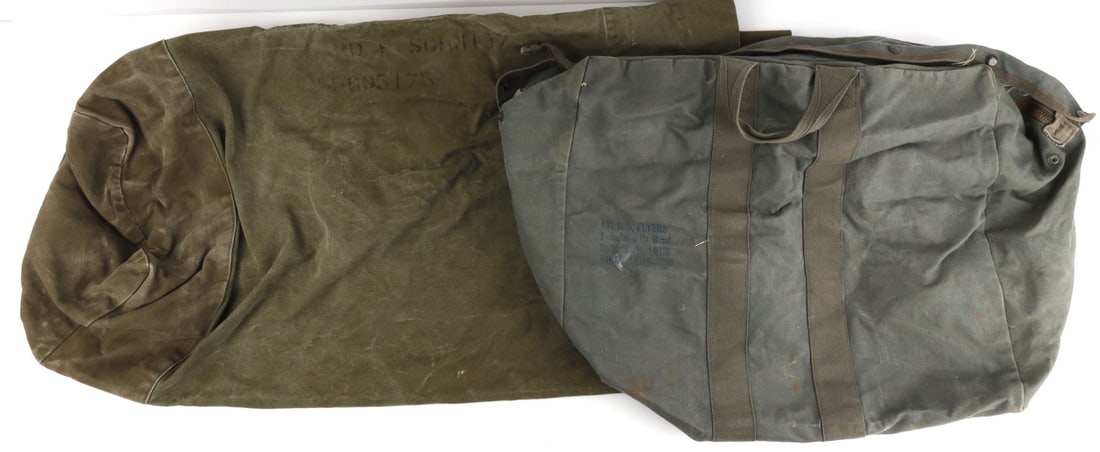 USGI FLYER'S KIT BAG & VIETNAM WAR CANVAS DUFFLE: Lot of TWO (2) pieces USGI canvas storage gear. The first is stamped "Kit bag, flyer's, Industries f/t Blind, Date: May 1983, 8460-00-608-8366 SS." The second is a Vietnam War-era barrel-style top loa