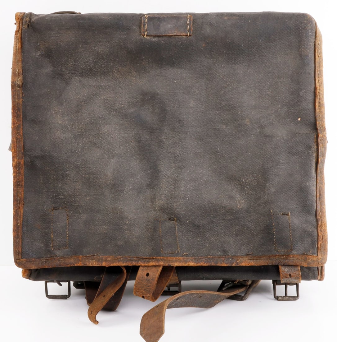US CIVIL WAR SOLDIERS BACKPACK LIKELY UNION NAMED: Civil War soldier's backpack, likely Union. Rubberized canvas, wooden frame. Has the name 'Simon' written on the interior. 12.5 X 4.25 X 14 inches. Very good, original condition.
