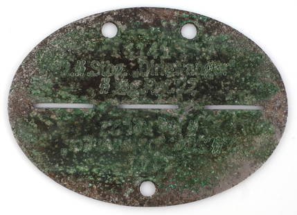 WWII GERMAN THIRD REICH DIRLEWANGER DOG TAG: A dog tag for the Dirlewanger Brigade. Greening on front, loss of legibility across tag. Oxidized, portions are colored in white paint. 2.75 X 2 inches. Unauthenticated, sold as is. This lot has a res