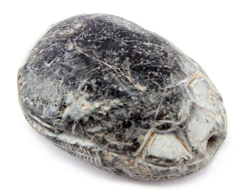 EARLY REPRODUCTION EGYPTIAN SCARAB: Very old reproduction of a carved soapstone Egyptian scarab. Copies of ancient Egyptian scarabs were produced from the Ancient Roman-era through the late-19th century. The bottom features Egyptian gly
