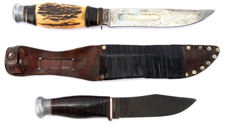 TWO VINTAGE FIXED BLADE KNIVES SCHLEIPER & KINFOLK: Lot of two vintage fixed blade knives. Stag handled 1970's "Jim Bowie" by Carl Schleiper, Solingen, with tape repair to scabbard, and Kinfolks skinning knife, with no scabbard. Both in well used condi