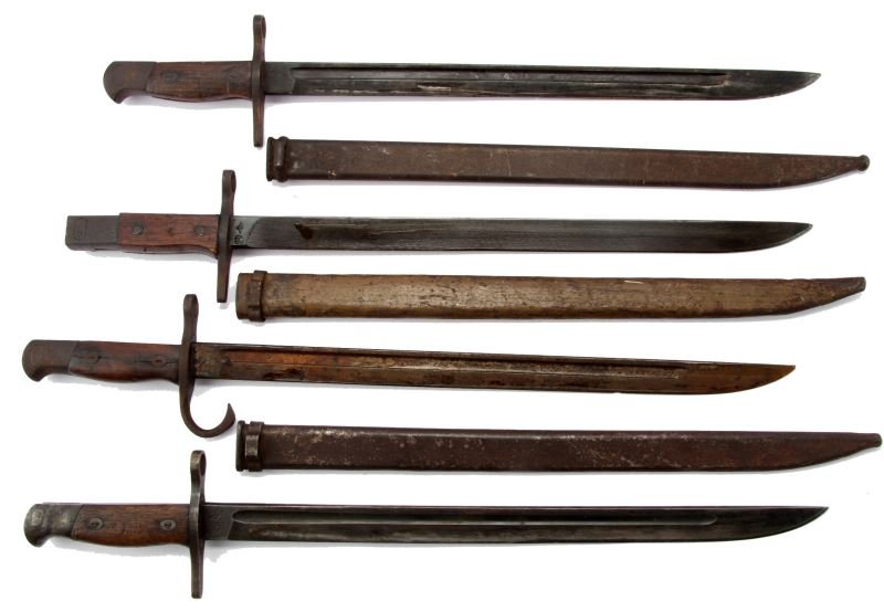 COLLECTOR LOT OF WWII JAPANESE ARISAKA BAYONETS: Collector lot of WWII Imperial Japanese Arisaka rifle bayonets. A) Straight quillon, rounded pommel, with Toyoda Jidoshoki Seisakusho (Toyoda Automatic Loom Works) under Nagoya Arsenal supervision mar