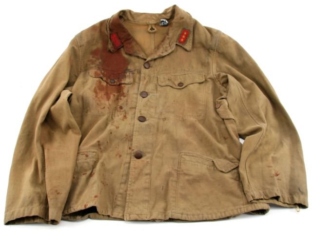 LETTERS FROM IWO JIMA SCREEN-WORN JAPANESE TUNIC: Screen-worn in "Letters from Iwo Jima" (Warner Bros. / Dreamworks. 2006) directed by Clint Eastwood. Size M with applied "blood" for filming. Includes COA from costume company. This lot has a reserve.