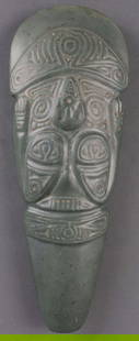 PRECOLUMBIAN TAINO CARVED CELT AXE HEAD: Pre-Columbian Taino (1000-1500 CE) carved ceremonial axe head, commonly known as a celt. This celt is carved with an incredibly abstract figure, possibly depicting either a standing, smiling figure or