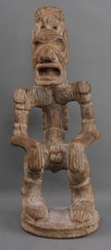 PRECOLUMBIAN TAINO SITTING MALE EFFIGY WOOD