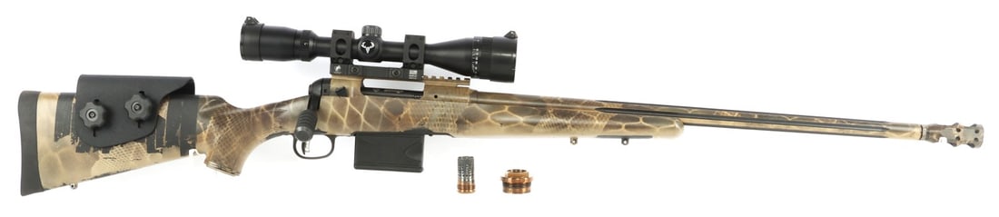 CUSTOM SAVAGE MODEL 10 .308 WIN BOLT ACTION RIFLE: Custom Savage Model 10 bolt-action rifle with Bushnell Trophy XLT 4-12x40 scope, muzzle brake (installed), Q Cherry Bomb muzzle device and Q Plan-B suppressor mount. Fluted 23.5-inch barrel, camouflag
