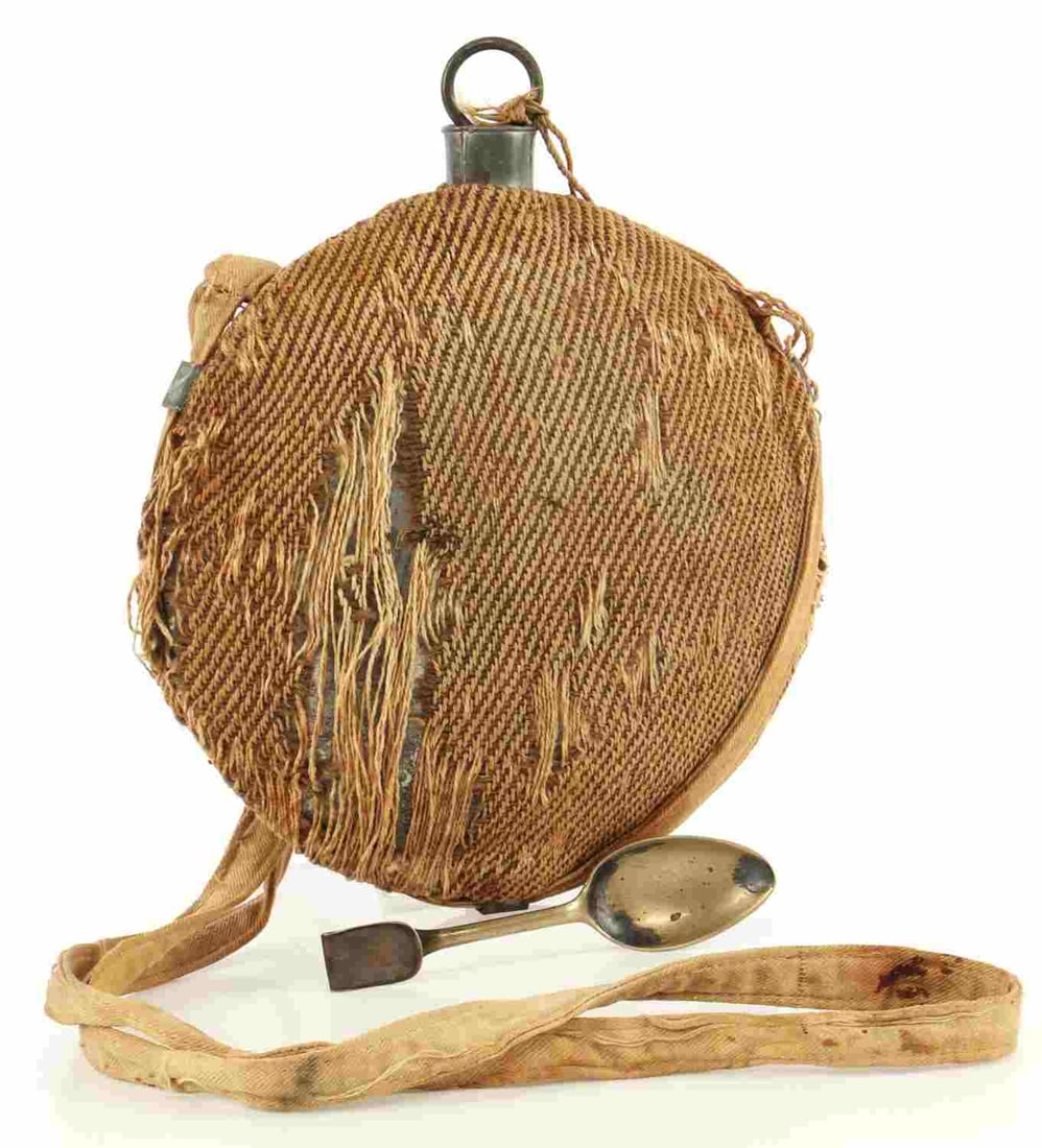 US CIVIL WAR SMOOTHSIDE CANTEEN WITH COVER & SPOON: Early Civil War smooth side metal canteen with original sling, cover, and field spoon. Some tears and holes in the cover, but expected wear for age. Stopper intact. 8.5-inch diameter. Very good, origi