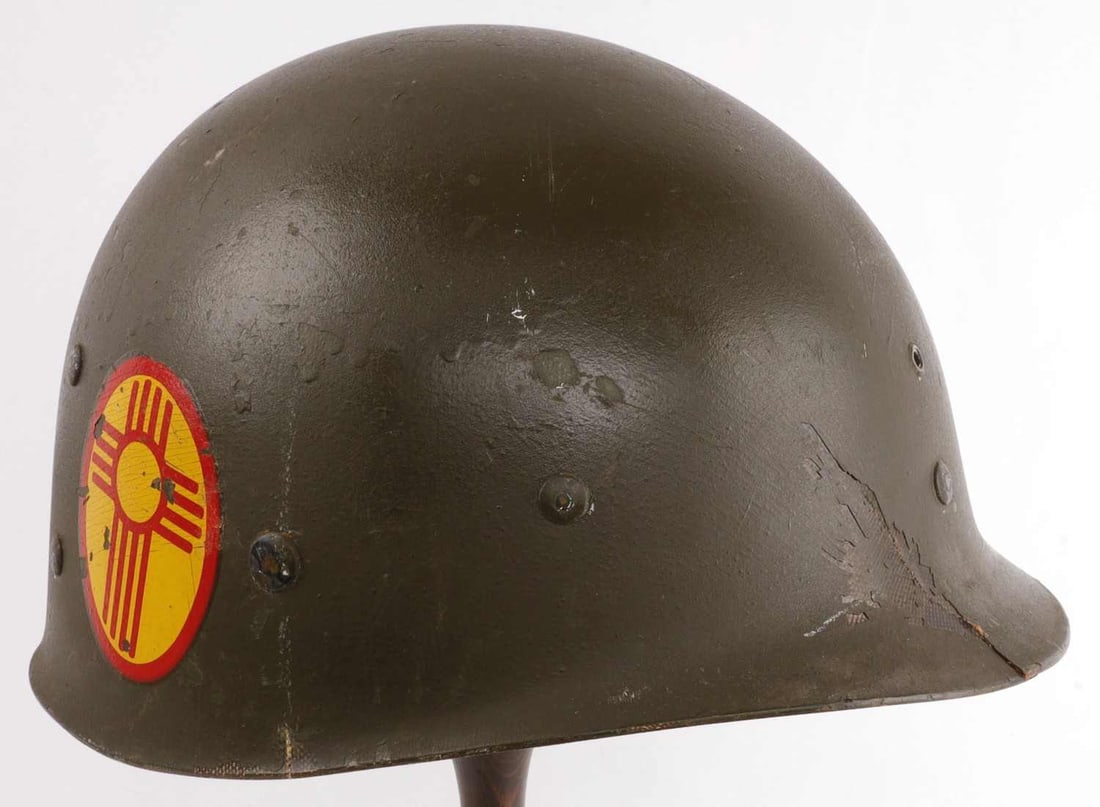 KOREAN WAR 4TH ARMY NM US M1 HELMET LINER INSIGNIA: US M1 helmet liner. Left exterior has 4th Army decal and right has New Mexico Zia Sun insignia. Interior has chinstrap studs. Front has insignia mount hole. Dome interior has Westinghouse mark and "D 