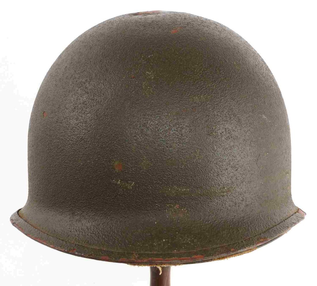US M1 STEEL HELMET WITH WESTINGHOUSE LINER: Rear seam, swivel chinstrap loops. Lot code not visible. Westinghouse liner. Good condition. No chinstrap.