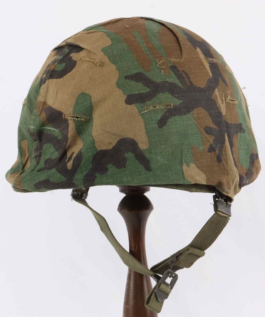 US M1 HELMET EURO WOODLAND CAMO COVER & CMP LINER: Complete US M1 steel combat helmet with chinstrap, European woodland camouflage cover and CMP liner. Rear seam, swivel chinstrap loops. Lot code not readily visible. Very good condition.