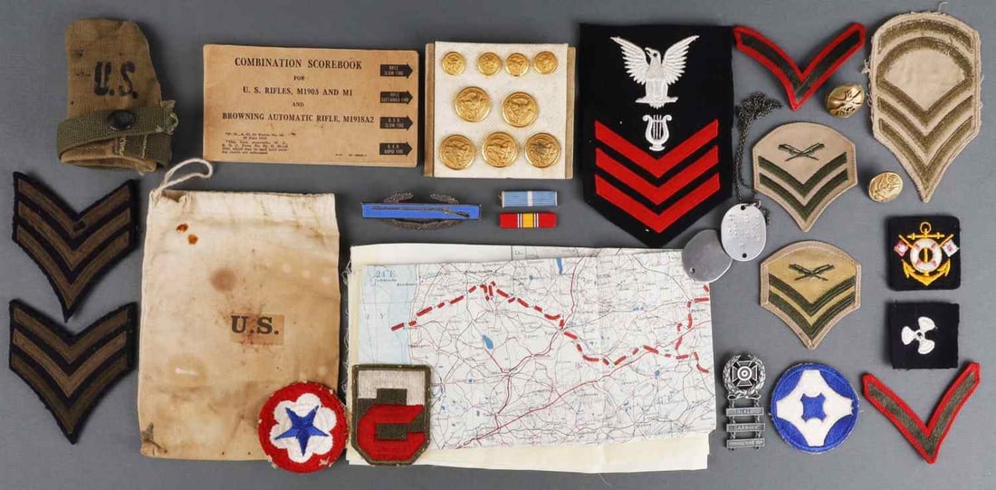 LOT OF 33 WWII US ESCAPE MAP PATCHES CIB INSIGNIA: Lot of THIRTY-THREE (33) pieces assorted WWII uniform patches, insignia, buttons, and artifacts. Includes sterling silver Combat Infantryman Badge (CIB), Riga-Stockholm pilots silk escape map (pub. 19