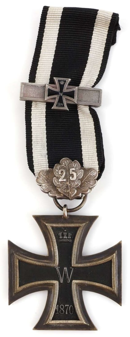 1870 IMPERIAL GERMAN IRON CROSS 2ND CLASS: Silver frame with magnetic core. Comes with 25 year oak leaves and 1914 clasp. It measures 1 3/4 inches. Very good condition. This lot has a reserve.