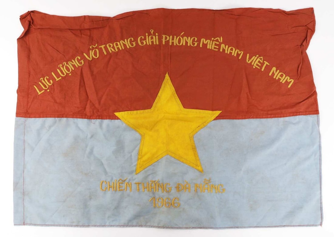 VIETNAM WAR VIET CONG CAMPAIGN FLAG: A flag for the National Liberation Front of South Vietnam or Viet Cong. Dated 1966. 28 X 21 inches. Very good, original condition.