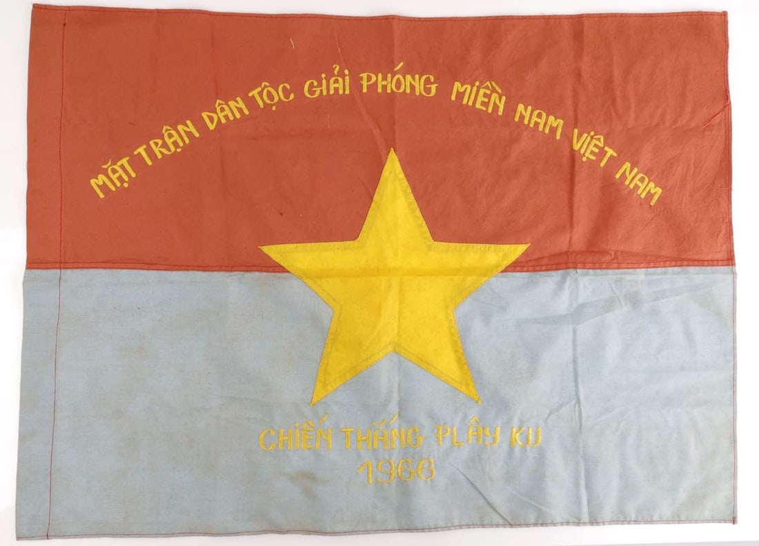 VIETNAM WAR VIET CONG CAMPAIGN FLAG: A flag for the National Liberation Front of South Vietnam or Viet Cong. Dated 1966. 30 X 22 inches. Very good, original condition.
