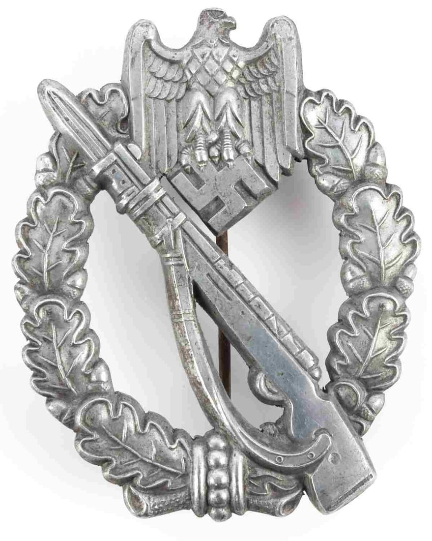 WWII GERMAN INFANTRY ASSAULT BADGE: Late war zinc type marked FZ under hinge. Measures 2 3/8 inches. This lot has a reserve.