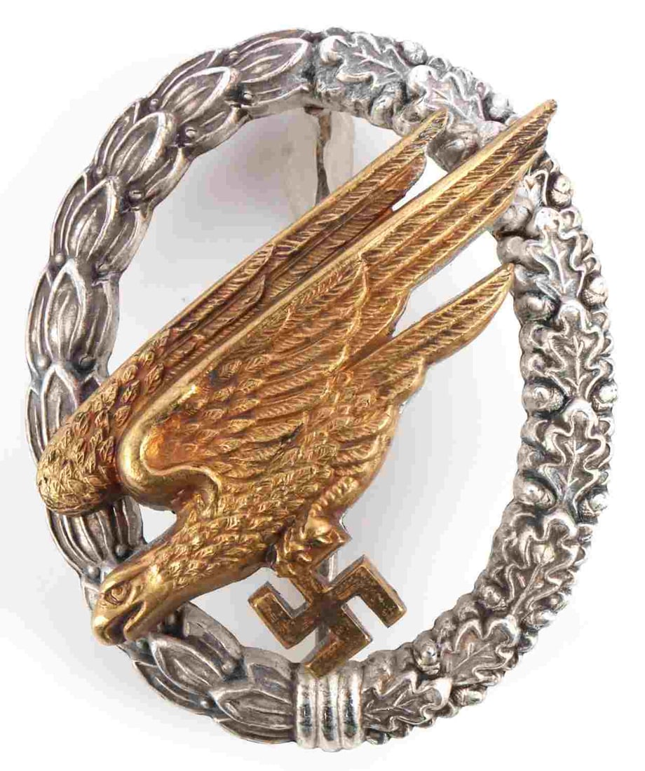 WWII GERMAN LUFTWAFFE PARATROOPER BADGE: Heavy 1st pattern type in brass. C.E. Juncker make. Measures 2 inches. Very good condition. This lot has a reserve.