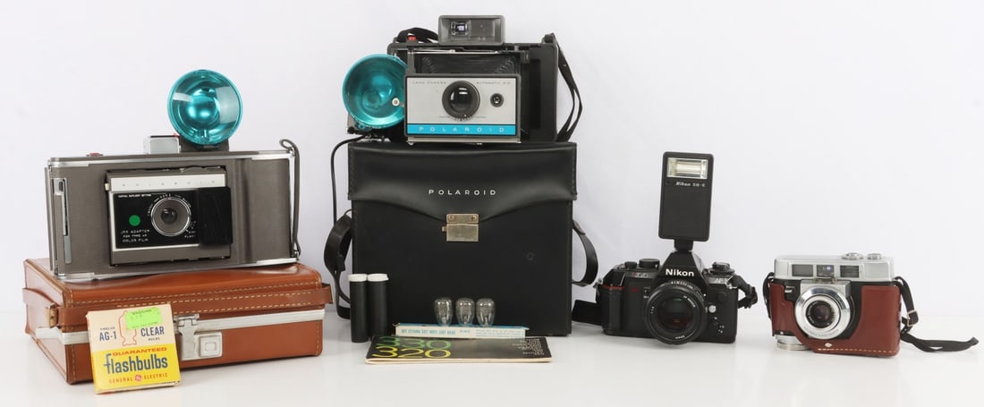 CAMERA LOT OF 4 POLAROID KODAK NIKON: Sold as is, untested. Nikon N2020, Kodak Motormatic 35, and the 2 Polaroid's with cases.