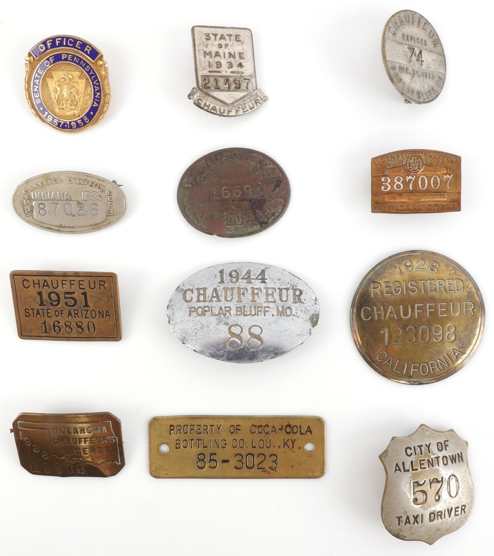 LOT OF 12 ANTIQUE OCCUPATION BADGES: Lot of TWELVE (12). Includes: NINE (9) chauffeur badges for various cities and states, ONE (1) Officer State of Pennsylvania badge, ONE (1) taxi driver badge, and ONE (1) Coca Cola factory tag. Very g