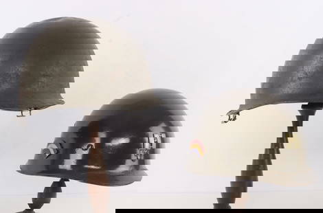 WWII US 42ND INFANTRY M1 HELMET & LINER ENAMEL DUI: US M1 steel combat helmet with Westinghouse liner. Helmet has swivel chinstrap loops and rear seam, lot code stamp not visible. Liner has 42nd Infantry Division enamel insignias on left and right side