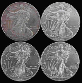 4 MIX DATE 1 OZT SILVER AMERICAN EAGLE BU COIN LOT