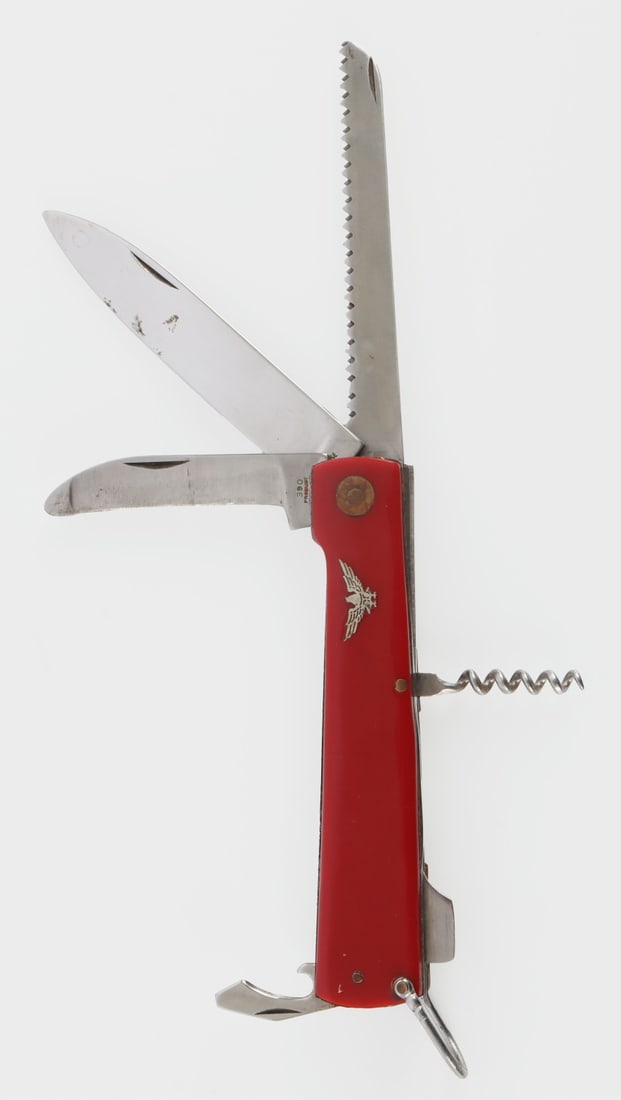 SYRACUSE KNIFE COMPANY LARGE MULTI TOOL: A large multi-tool produced by the Syracuse Knife Company, possibly for the Polish military. Made in Poland. One of the blades has been significantly re-sharpened. 5 inch handle.