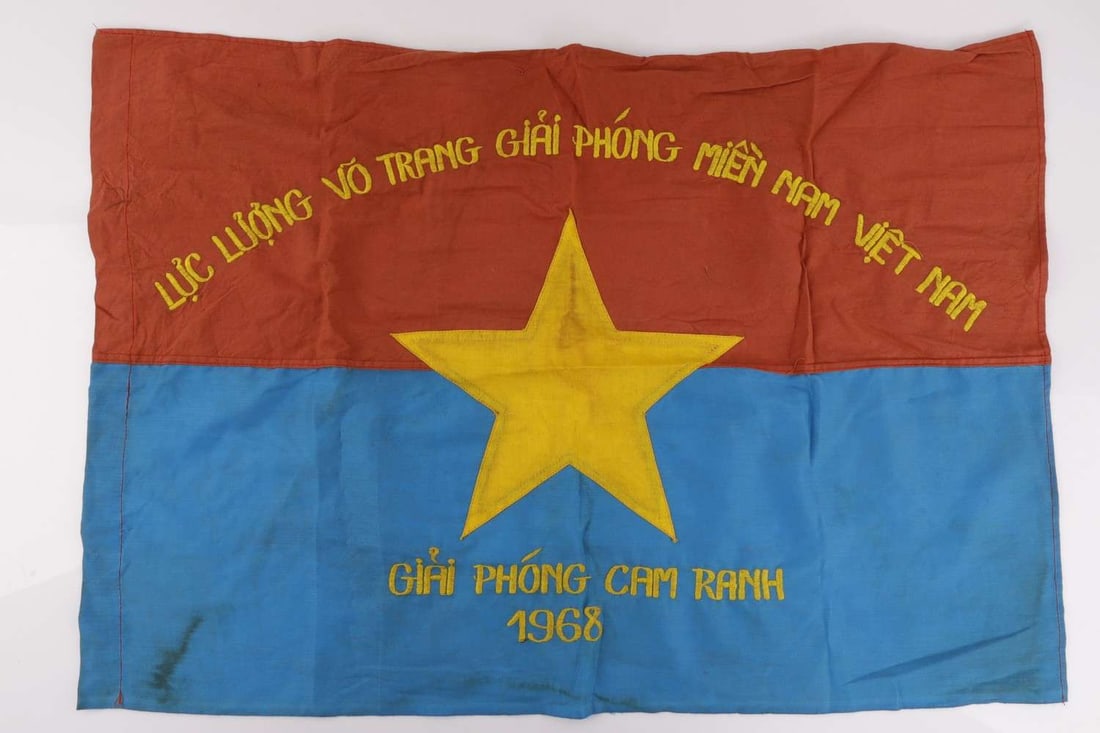 VIETNAM WAR VIET CONG CAMPAIGN FLAG: A flag for the National Liberation Front of South Vietnam or Viet Cong. Dated 1968. 30 X 21 inches. Very good, original condition.