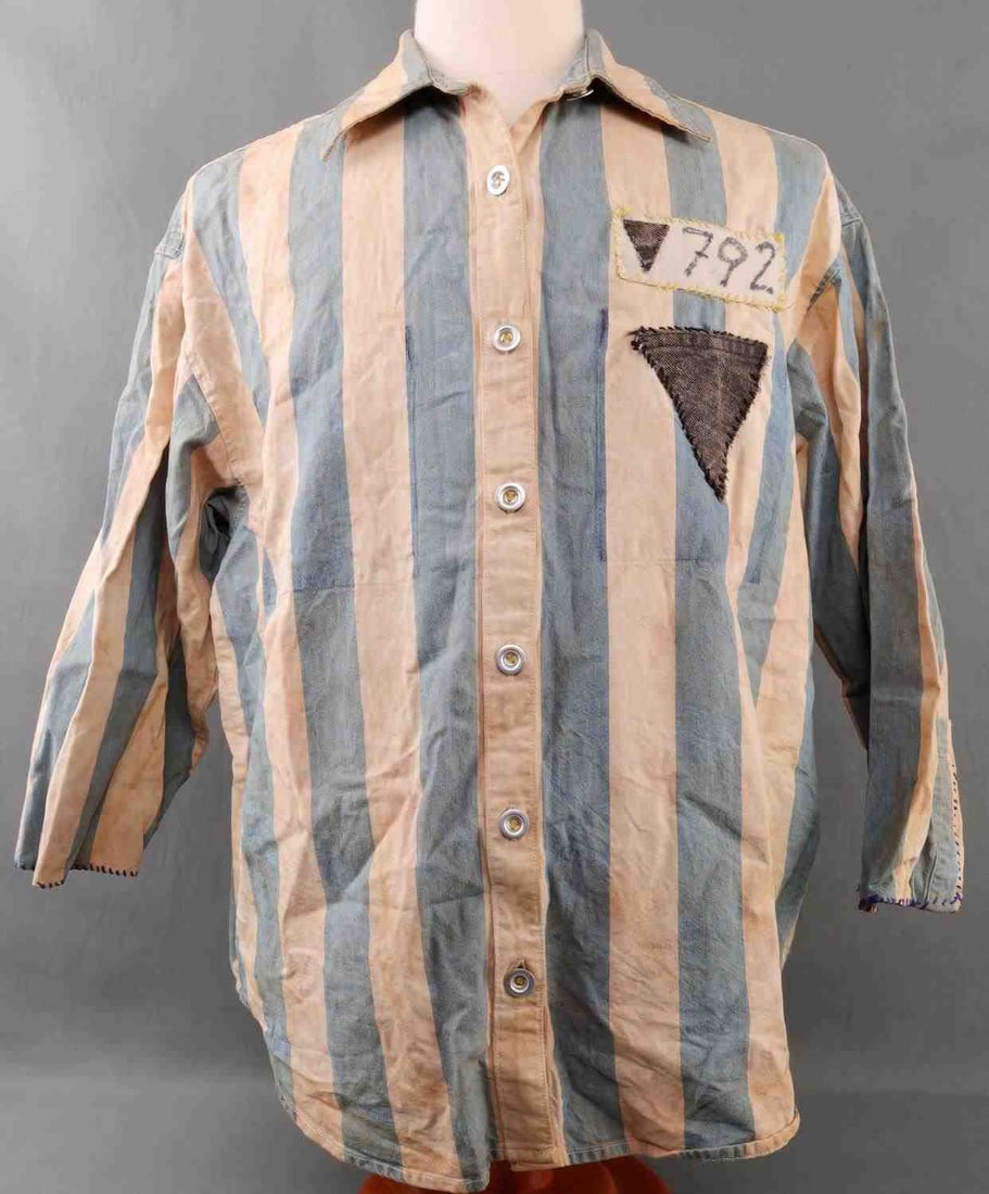 GERMAN WWII CONCENTRATION CAMP UNIFORM JACKET: Light blue and white striped concentration camp uniform jacket. Black triangle indicates 'anti-social' or 'Roma, prisoner number 792. Fluoresces. 24 inches buttoned collar to hem, 21 inches shoulder t