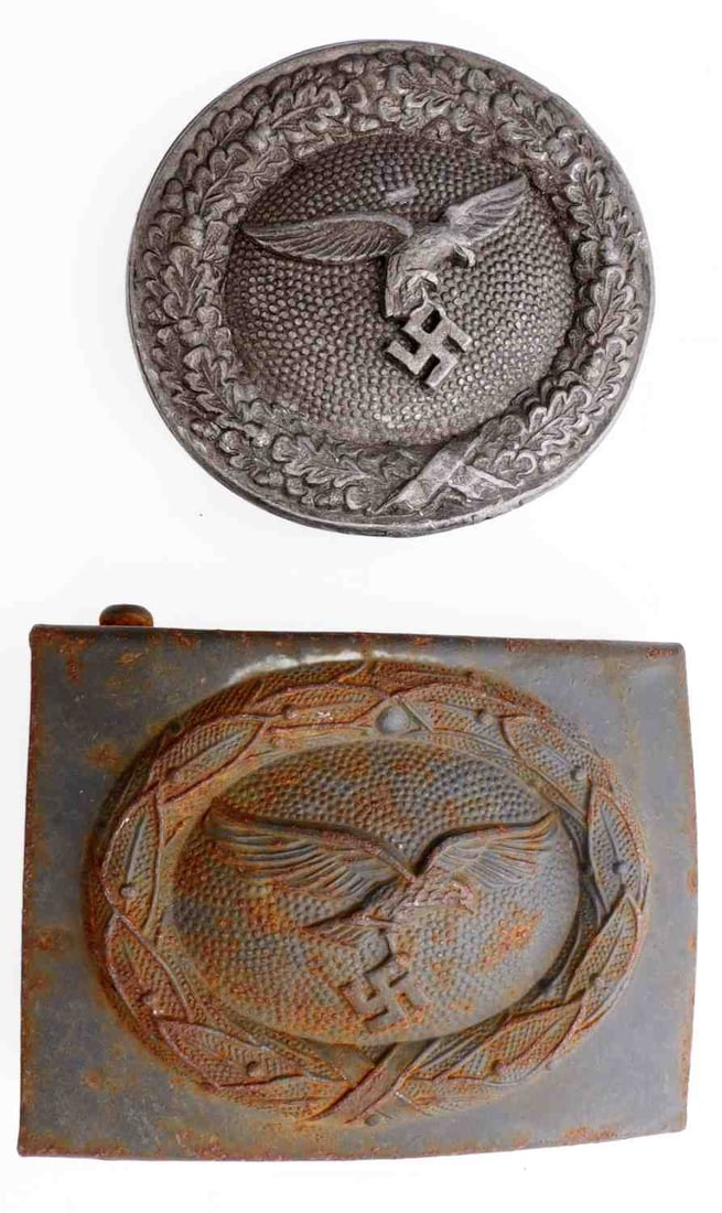 WWII GERMAN LUFTWAFFE BELT BUCKLE LOT OF 2: Lot of two (2) pieces. Includes EM buckle, of steel (2 by 2-1/8 inches), and officer's buckle, of non-magnetic alloy (2-1/8 by 2-1/4 inches). Good condition. Some oxidation.