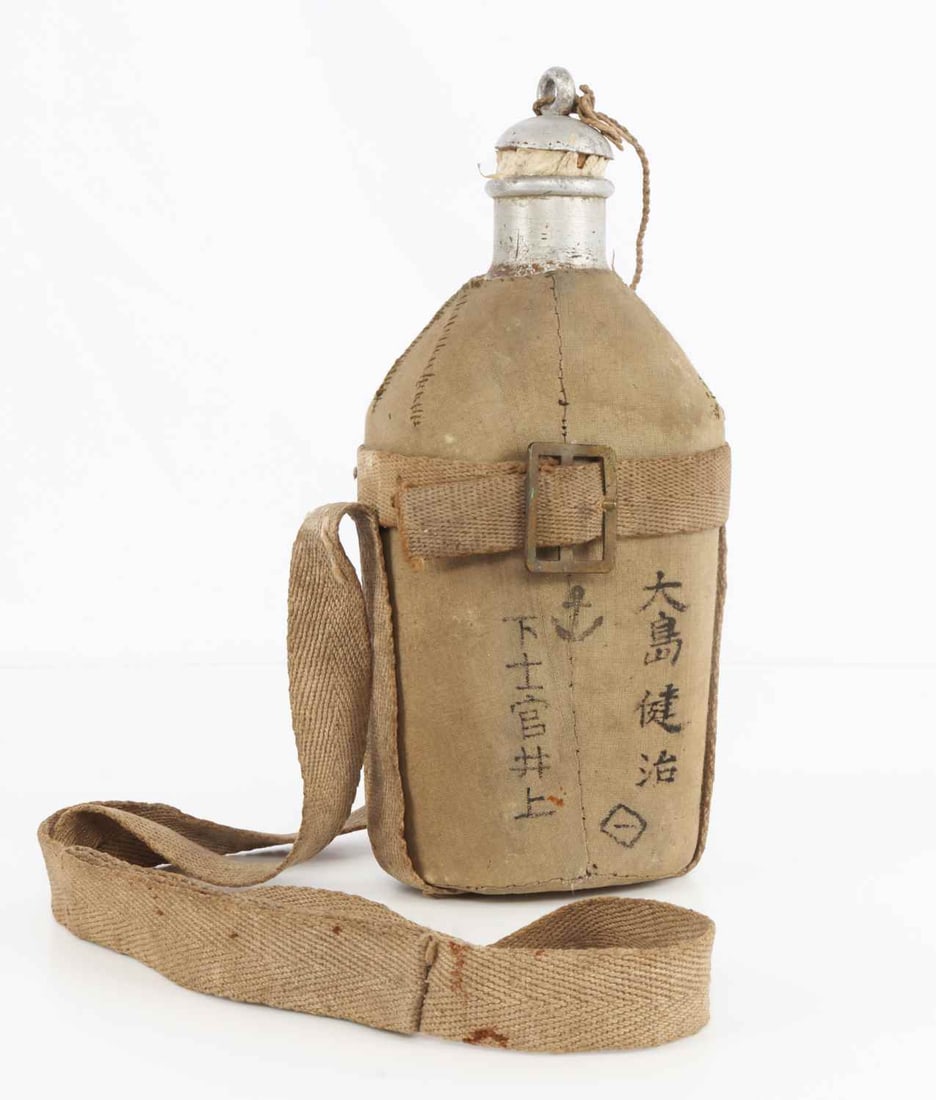WWII JAPANESE INK STAMPED SNLF CANTEEN: A WWII canteen for the Japanese Special Naval Landing Forces. Ink stamped on bottom. Canteen indicates that the individual who carried it was equivalent to a Chief Petty Officer. Very good, original c