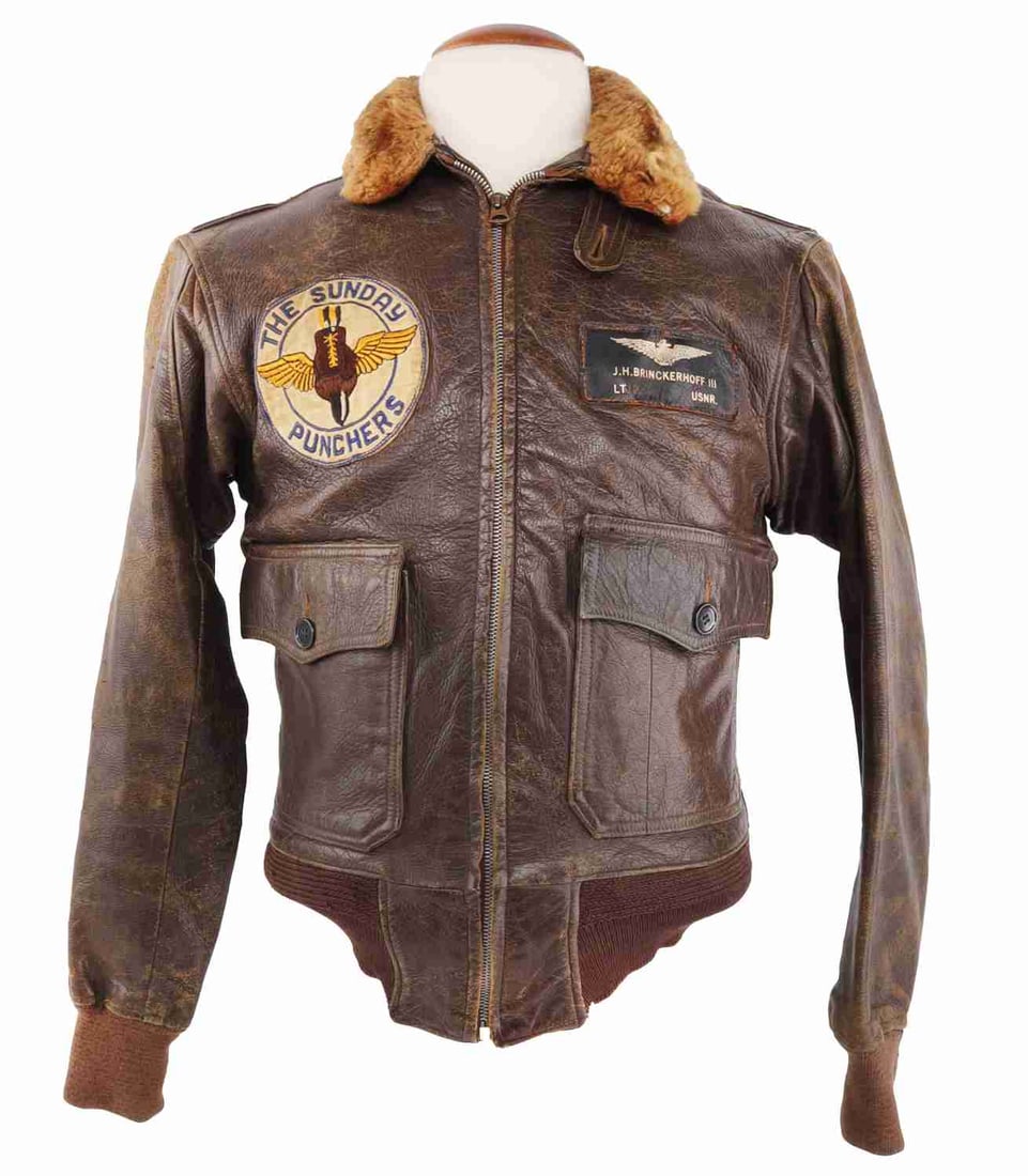 KOREAN WAR US PILOT G-1 JACKET WITH PATCHES: Named to J.H. Brinckerhoff III. Patch is for Attack Squadron 75, also known as the Sunday Punchers. Jacket features usage wear but does not appear to have tears. Size is a medium. A-1 Skyraiders enter