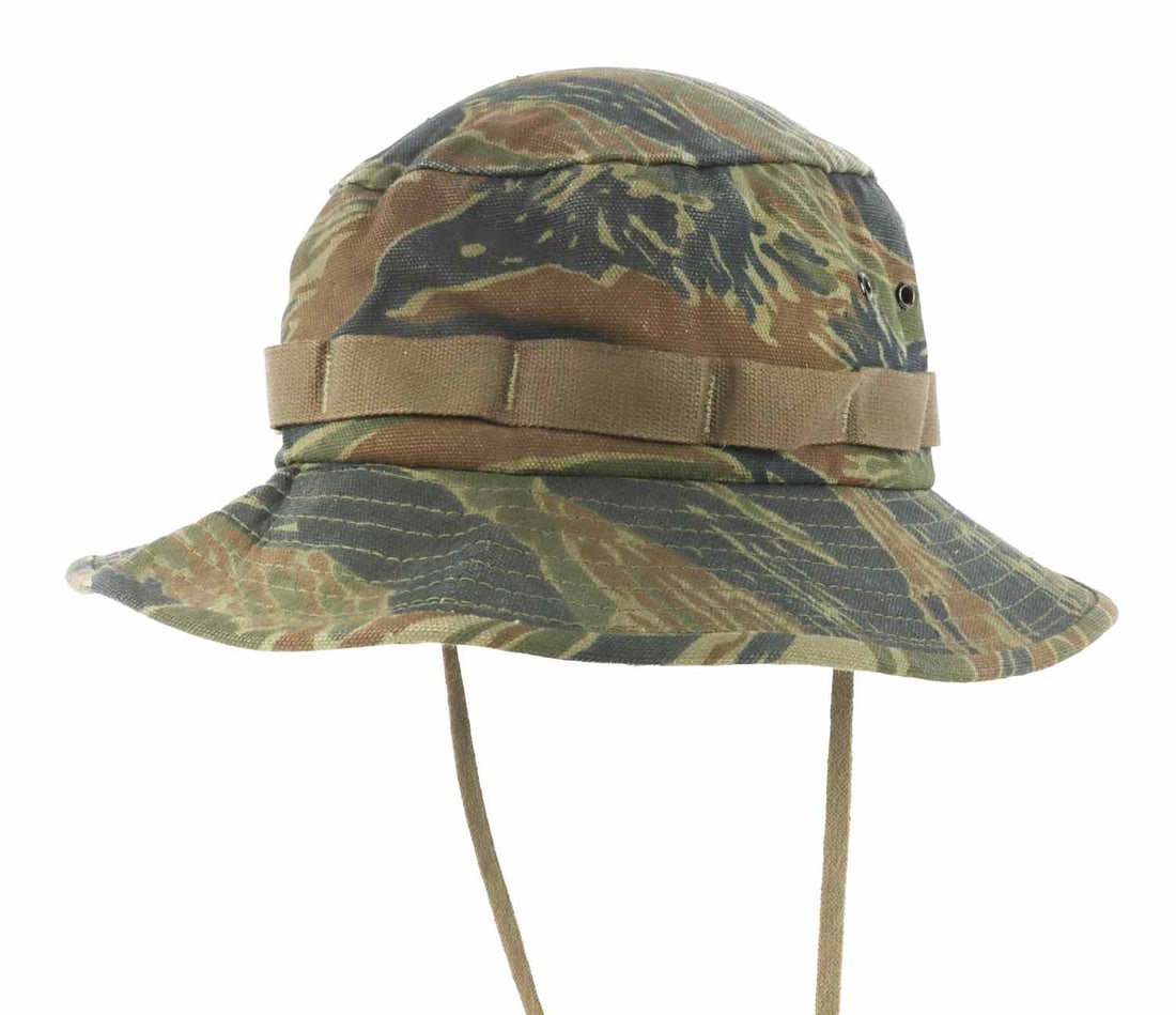 VIETNAM WAR TIGER STRIPE CAMO BOONIE HAT: An American boonie hat from the Vietnam War period in tiger stripe camouflage. Approximately a size medium. Very good, original condition.