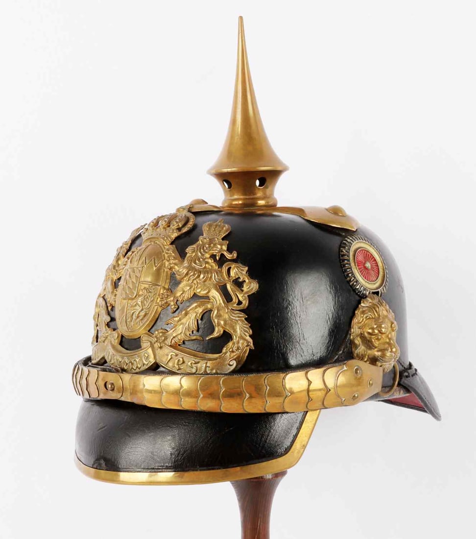 WWI BAVARIAN GENDARMARIE PICKELHAUBE HELMET: Pattern 1886. Lacquered leather construction with liner. Brass spike, plate, and chin strap. Size is unknown but measures 7 1/2 inches on interior. Very fine condition overall.