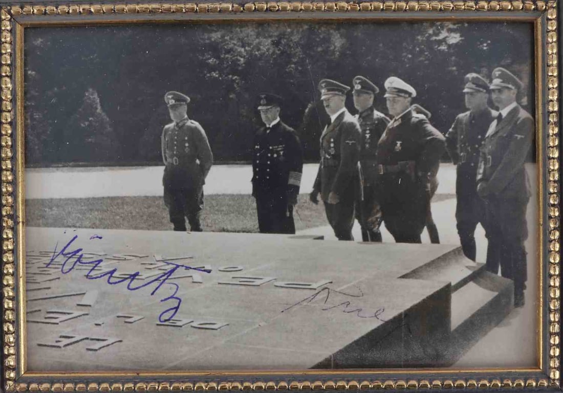WWII GERMAN REICH DOENITZ & HESS AUTOGRAPHS COA: A photograph of several members of the senior leadership of the NSDAP/German Third Reich. This photograph is signed by Karl Doenitz and Rudolf Hess. Framed. Certificate of Authenticity from Frank Garo
