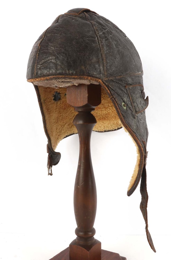 WWII GERMAN THIRD REICH EARLY LUFTWAFFE FLIGHT CAP: A leather flight helmet for the German Third Reich's Luftwaffe, an early version. Leather on wool. Large size. Very good, original condition.