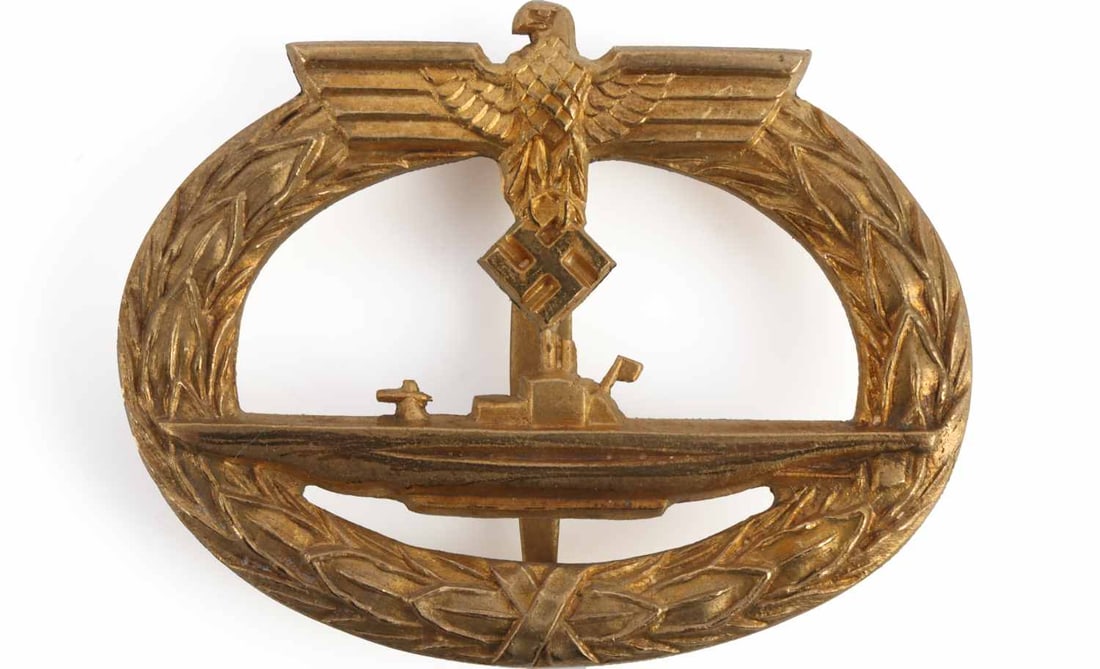 WWII GERMAN KRIEGSMARINE U BOAT BADGE: Nice gilding with high detail on eagle. No maker's mark. Very good condition. This lot has a reserve.