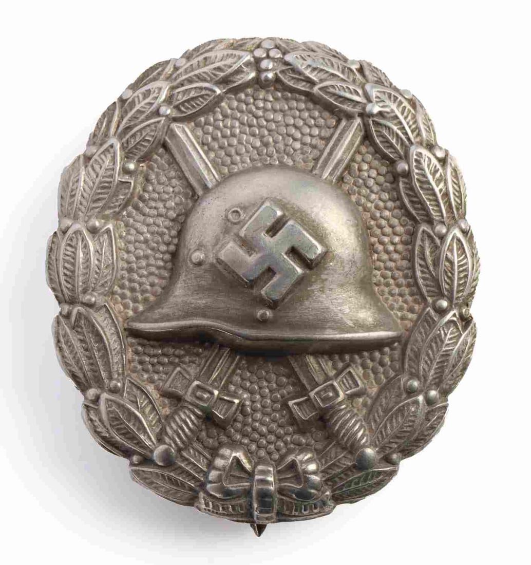 WWII GERMAN THIRD REICH CONDOR LEGION BADGE: Spanish Condor Legion wound badge in silver. Hollow back stamped type. This lot has a reserve.