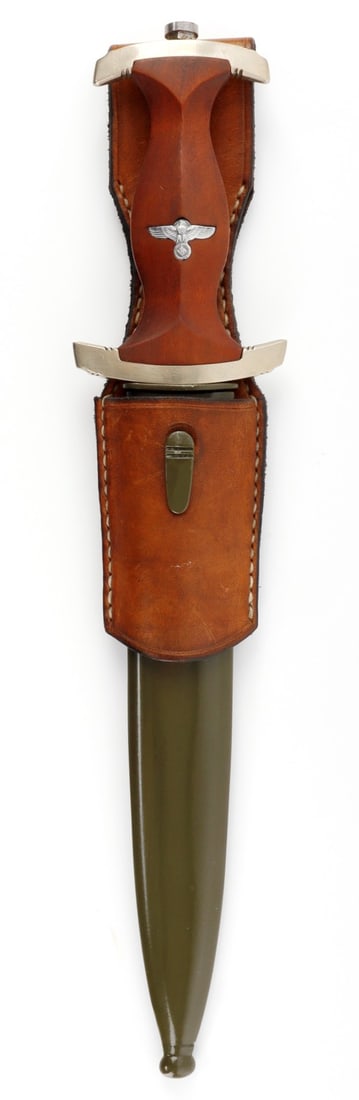 WWII GERMAN NPEA LEADER DAGGER KARL BURGSMULLER: NPEA leader's dagger by Karl Burgsmuller, with painted steel scabbard and leather frog. Nickel silver cross guards, reddish brown wood grip with nickeled eagle, and steel blade etched with maker's mar