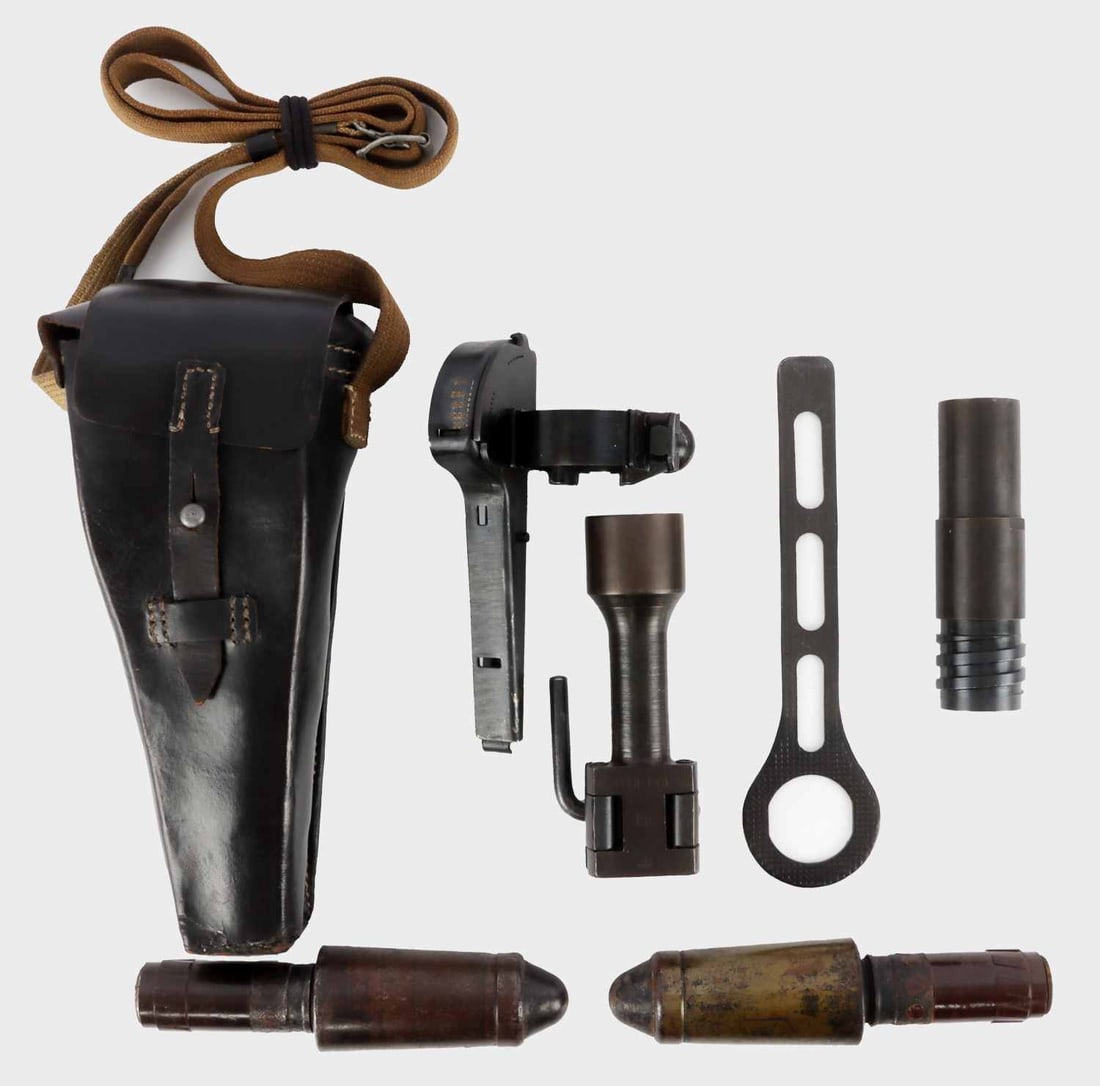WWII GERMAN MAUSER RIFLE GRENADE LAUNCHER: With leather case and additional rounds. Launcher is marked G. Gr. Ger, Lz6, and Waffenamt. The case is marked GXb 42 and Waffenamt. 30mm model 40 anti tank rounds are demilled. 98% mint. From the col