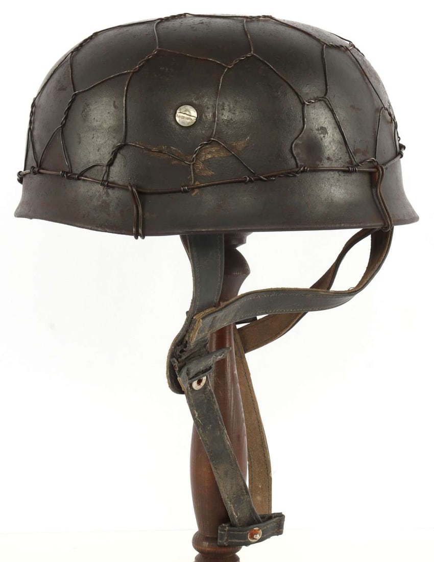 ORIGINAL WWII LUFTWAFFE PARATROOPER M38 HELMET: Single decal in slate grey. Four (4) bolts on each, but not traditional style. No ET mark. Possibly late war. Complete with liner and chinstrap. 10.5 inches.