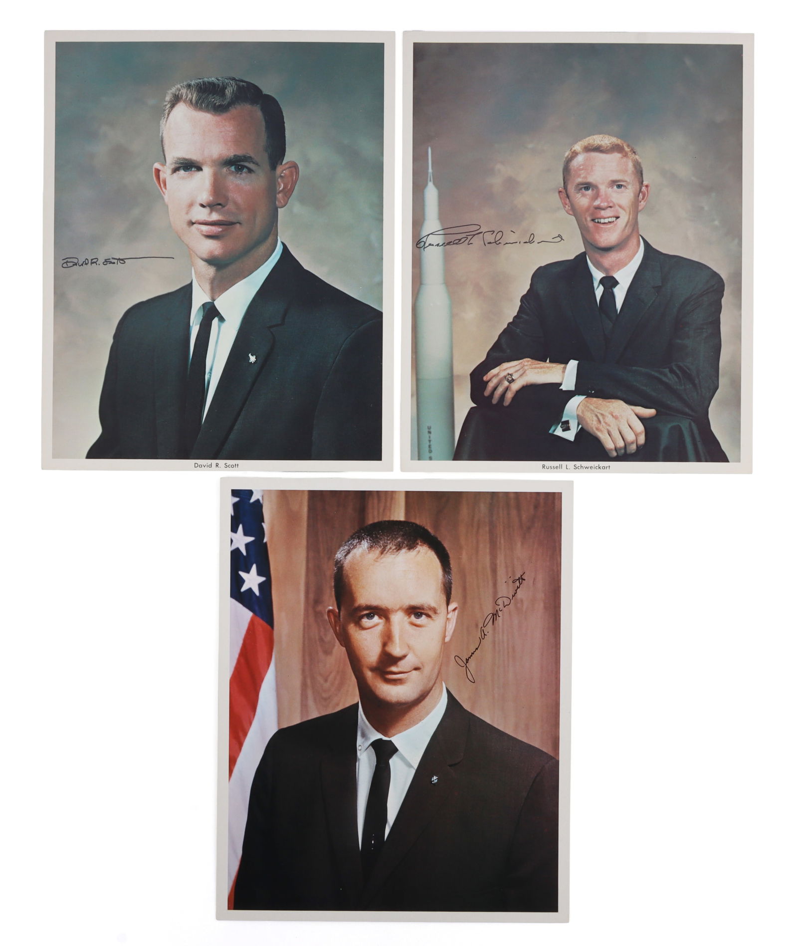 APOLLO 9 CREW SIGNED HEAD SHOT PHOTOS LOT OF 3: Three official release head shots, depicting James McDivitt, David Scott, and Rusty Schweickart. Each head shot is signed by the corresponding astronaut. These signatures were collected by a former NA