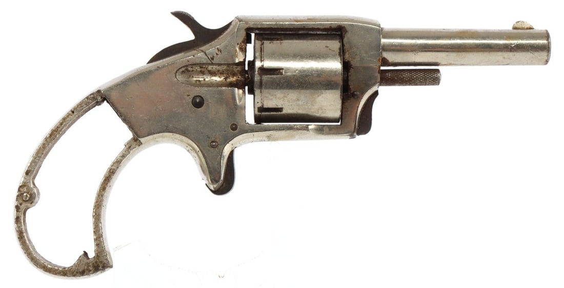 IVER JOHNSON DEFENDER .22 SPUR TRIGGER REVOLVER: Iver Johnson Defender .22 cal spur trigger revolver. 2.25-inch barrel, 7-round capacity. Top strap marked "Defender" and left grip frame "1989." Missing grips and mainspring. Antique. No international