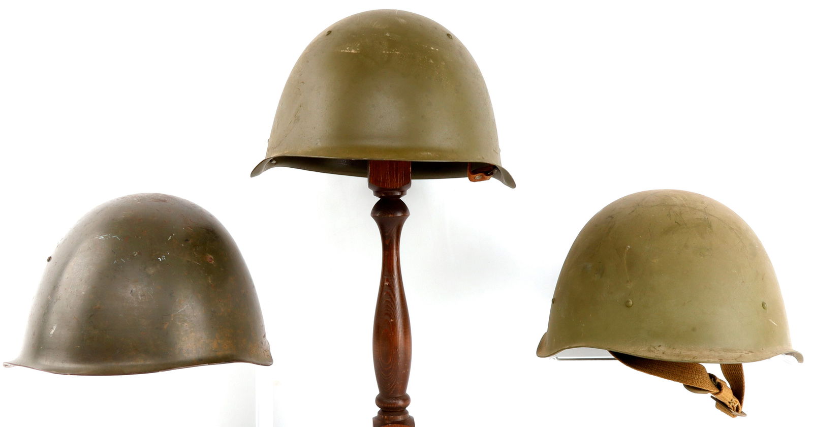 SOVIET RUSSIAN SSH-40 COMBAT HELMET LOT OF 3: Lot of three (3) SSH-40 steel combat helmets. Complete, with chinstraps and liners. Very good condition.